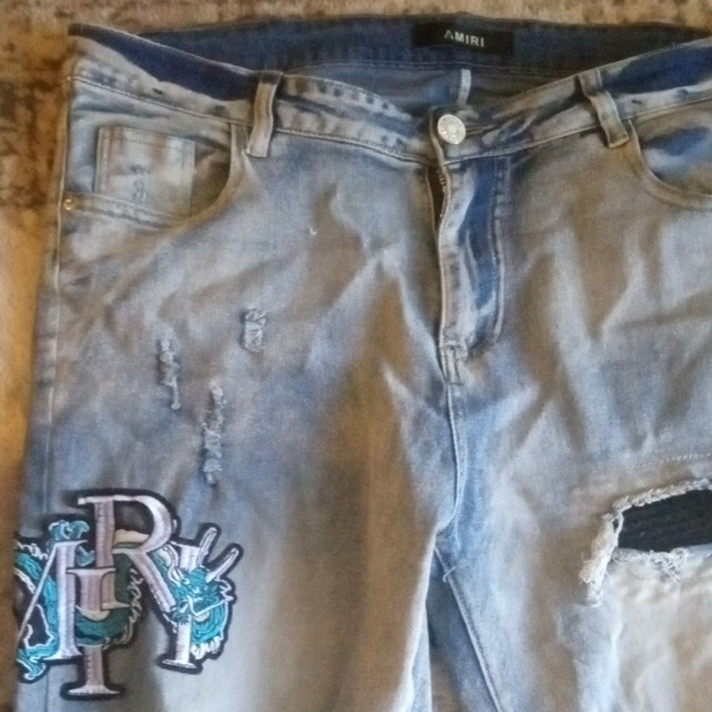 AMIRI Light Blue Skinny Jeans with Embroidered Patch
